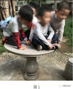 从小朋友在石桌上玩耍，看石桌产品安全